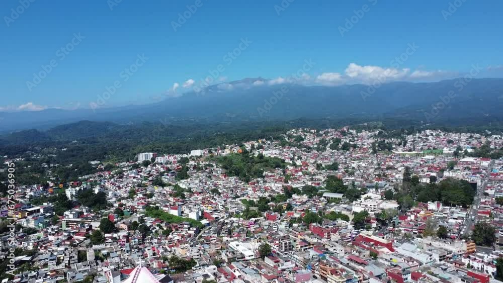 Mesmerizing aerial shot of a mountains in xalapa, veracruz, mexico, with the city at daytime, colorful city inr travel over america historic place touristic point.