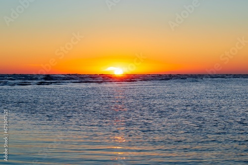 Scenic view of a beautiful sunset over the tranquil sea