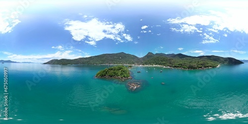 Fototapeta Naklejka Na Ścianę i Meble -  Big Island in Angra dos Reis surrounded by a tranquil blue ocean, Brazil