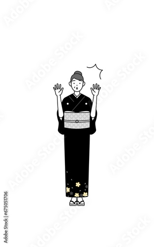 驚いて手を上げる着物姿のシニア女性、お正月の初詣や結婚式などで
