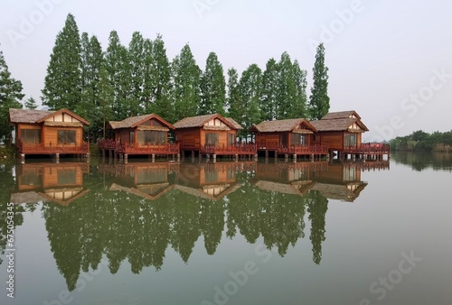 Row of wooden houses on the shore of Xianghu Lake, Hangzhou, China.