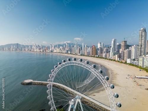 Spectacular view of a huge paddle wheel on Balneario Camboriu city beach photo