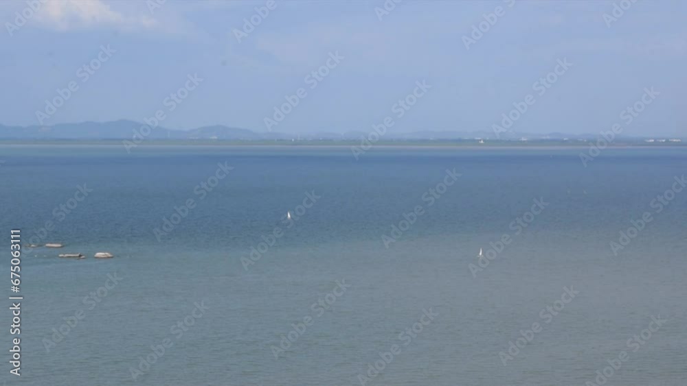 Aerial view of sailboats sailing on the water near Penang Aerial view of sailboats sailing on the water near Penang