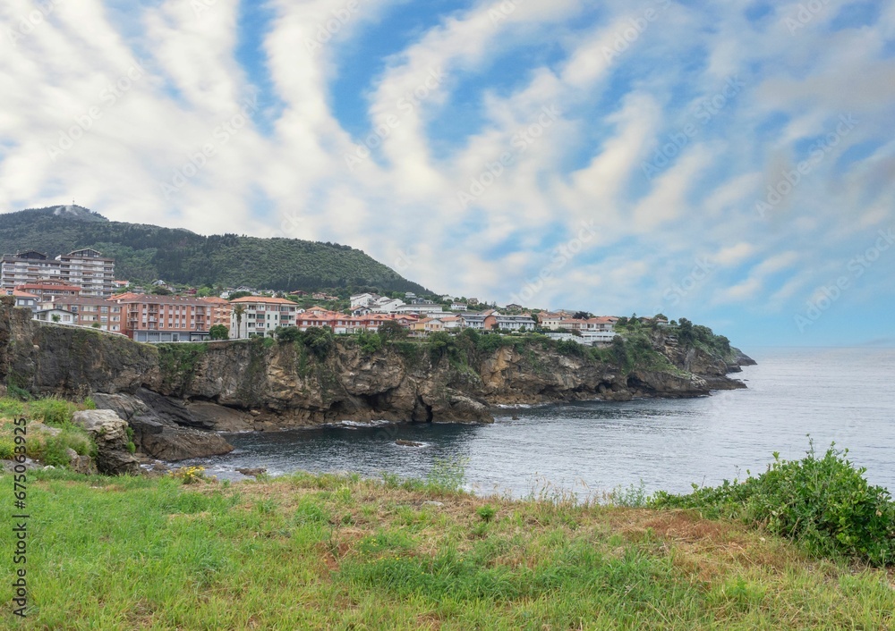 Views of the town of Bermeo from the outskirts overlooking the cliffs on a summer day
