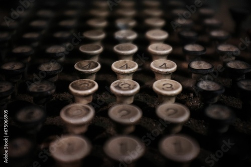 old typewriter buttons from an old typewriter machine displayed
