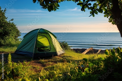 Camping on the beach at sunset. view of a camping tent on a summer evening.