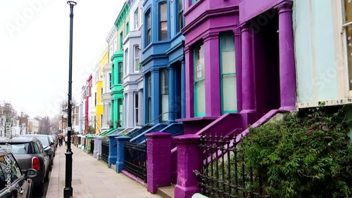 Lancaster Road houses with vibrant colors in Notting Hill district close to Portobello Road in London, UK photo