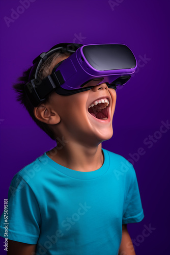 Young boy getting experience using VR headset glasses isolated on a purple background © dewaai