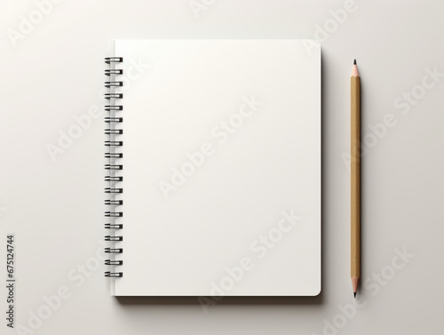 Top view of open spiral blank notebook on wood desk background. photo