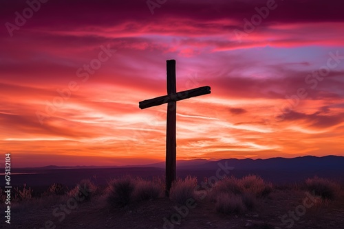 Concept or conceptual wood cross or religion symbol shape over a sunset sky background banner © Rudsaphon