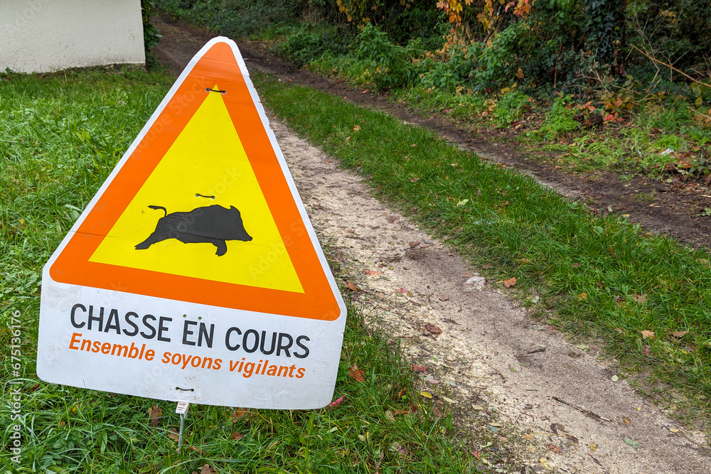 chasse en cours french sign text on panel means Warning signs Caution