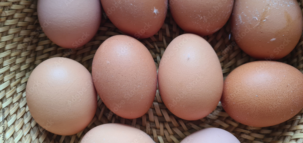 Chicken fresh eggs in a basket. Delicious healthy breakfast Chicken fresh eggs in a basket. Delicious healthy breakfast