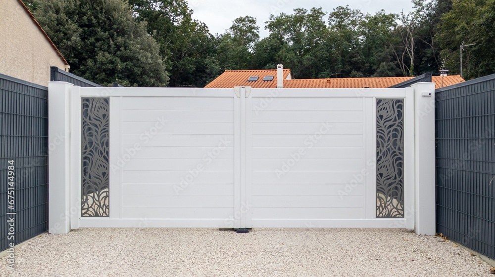 Aluminum white steel modern gate sliding new portal of suburb house door - obrazy, fototapety, plakaty 