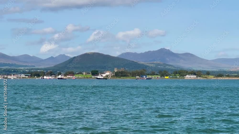 Sailing Serenity: Exploring Greencastle with Ships and Sailboats on a Sunny Day Amidst the Stunning Backdrop of the Mourne Mountains and Coastal Scenery Sailing Serenity: Exploring Greencastle with Ships and Sailboats on a Sunny Day Amidst the Stunning Backdrop of the Mourne Mountains and Coastal Scenery
