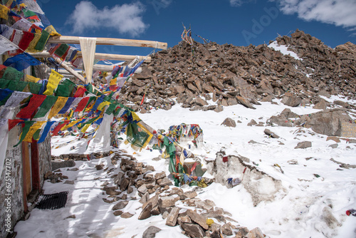 The beautiful views of Colorful Tibetan prayer flags on Khardung La or Khardung Pass