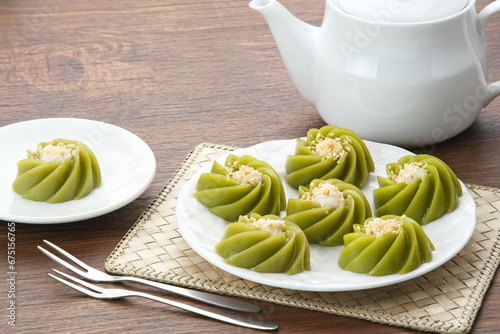 Kue Kaswi Pandan, traditional cake made from tapioca flour and pandan leaf, topping with sesame seed
 photo