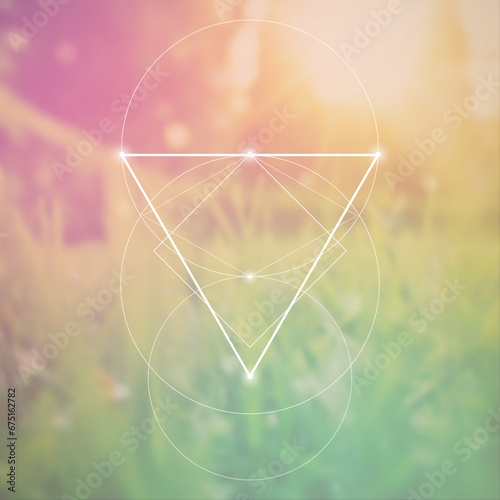 Sacred geometry spiritual new age futuristic illustration with transmutation interlocking circles, triangles and glowing particles