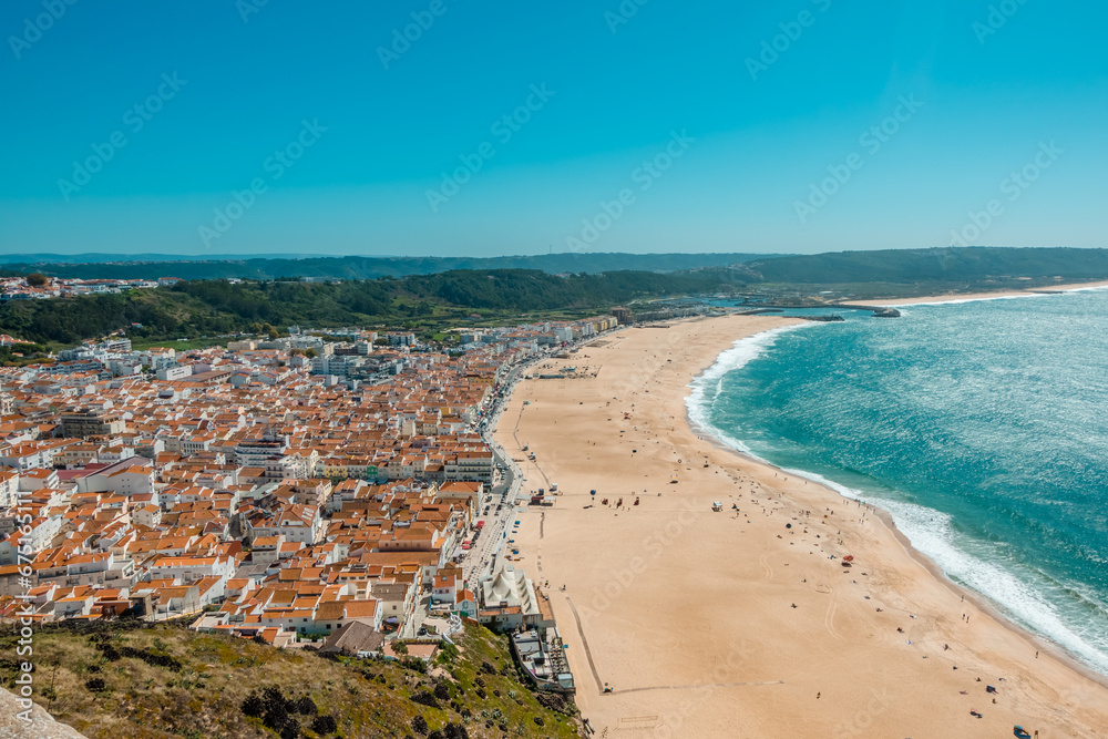 Fototapeta premium Aerial panoramic view of the beach town of Nazare, Portugal