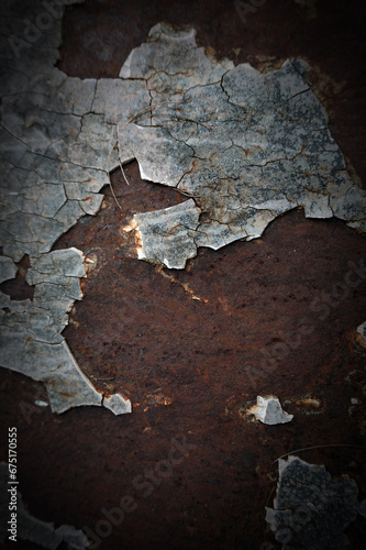 The texture of an old and rusted steel plate is used as a design