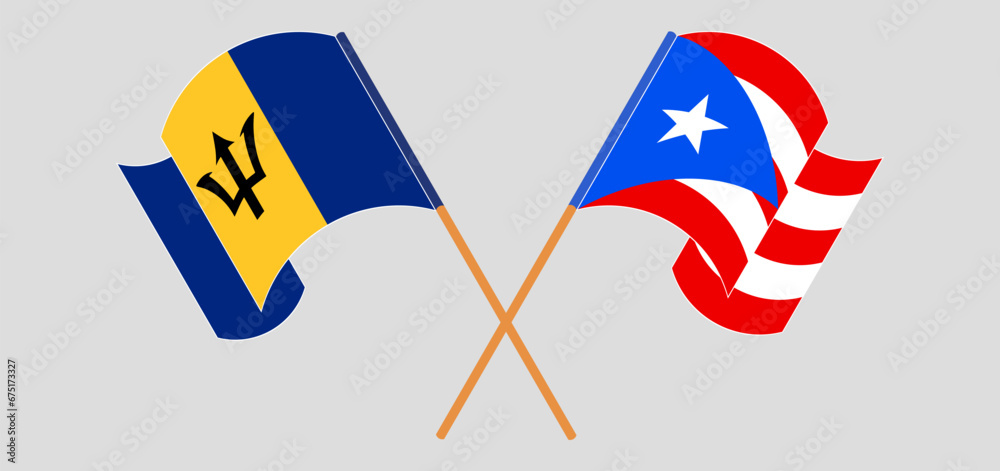 Crossed and waving flags of Barbados and Puerto Rico