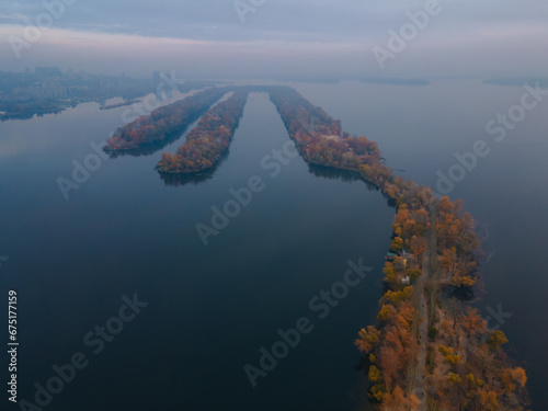 The rowing canal spit on Pobeda in the city of Dnieper from above. River View. Autumn colors. Drone photography. photo