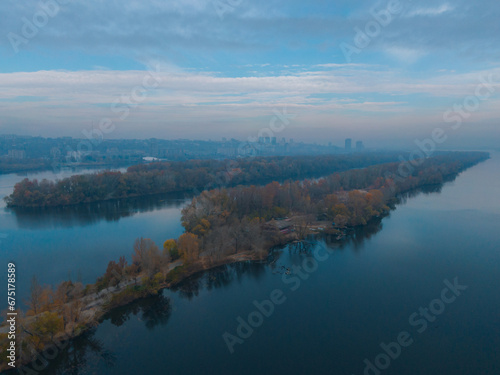 The rowing canal spit on Pobeda in the city of Dnieper from above. River View. Autumn colors. Drone photography. photo