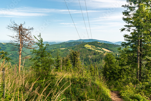 View from Velky Stozek hill in Slezske Beskydy mountains on czech - polish borders photo