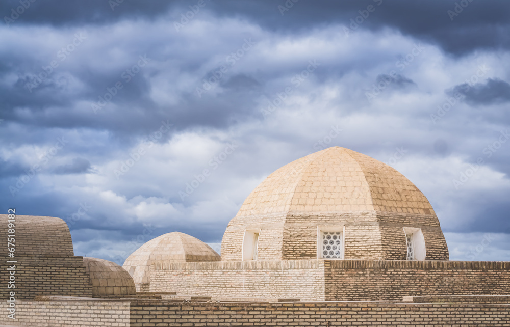 Ancient Muslim cemetery Mizdakhan with a centuries-old history on a hill in Uzbekistan with mausoleums and burials necropolis