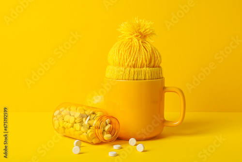 Tablets with a yellow cup and cap