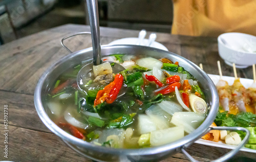 Spicy n-kaew soup is a spicy and intense-flavored Thai dish. 
It is known for its hot and sour taste and is a favorite among Thai people.
