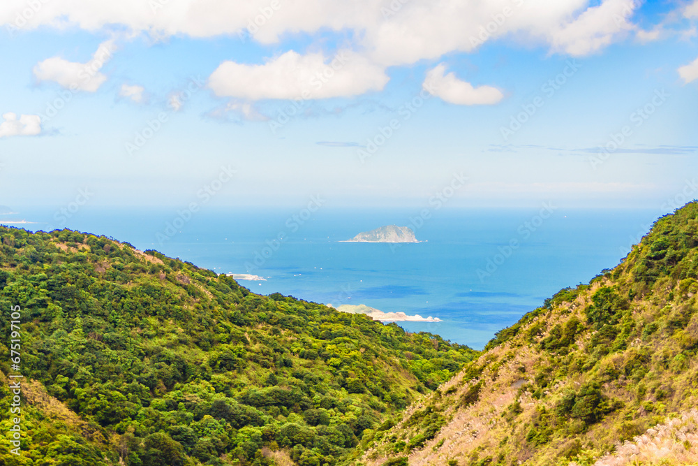 the view of Keelung Islet from a valley covered with Miscanthus the view of Keelung Islet from a valley covered with Miscanthus