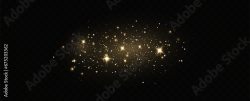 Golden sequins glow with many lights. Glittering dust. Luxurious background of golden particles.