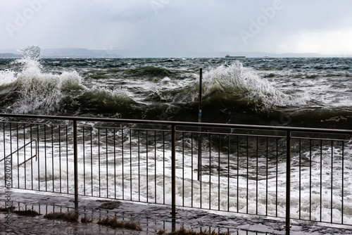 barcola beach with heavy stormy sea photo