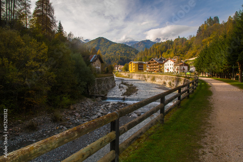 Il torrente Maè che attraversa il paese di Forno di Zoldo nelle Dolomiti bellunesi photo