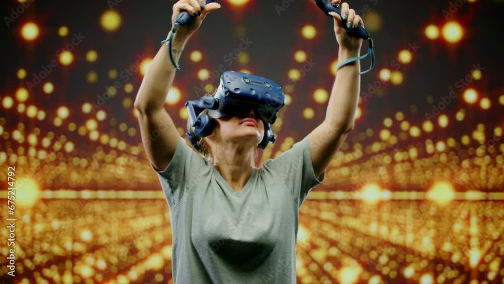 The woman wearing VR headset dancing in virtual reality. The beautiful
