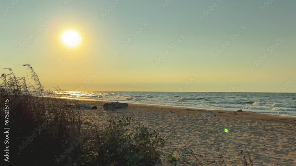 Sunset on the beach in Golubitskaya. Beautiful sunset on the background of the sea. Sunset landscape, amazing light of nature. The background of the nature environment.The Sea of Azov. Golubitskaya 4К Sunset on the beach in Golubitskaya. Beautiful sunset on the background of the sea. Sunset landscape, amazing light of nature. The background of the nature environment.The Sea of Azov. Golubitskaya 4К
