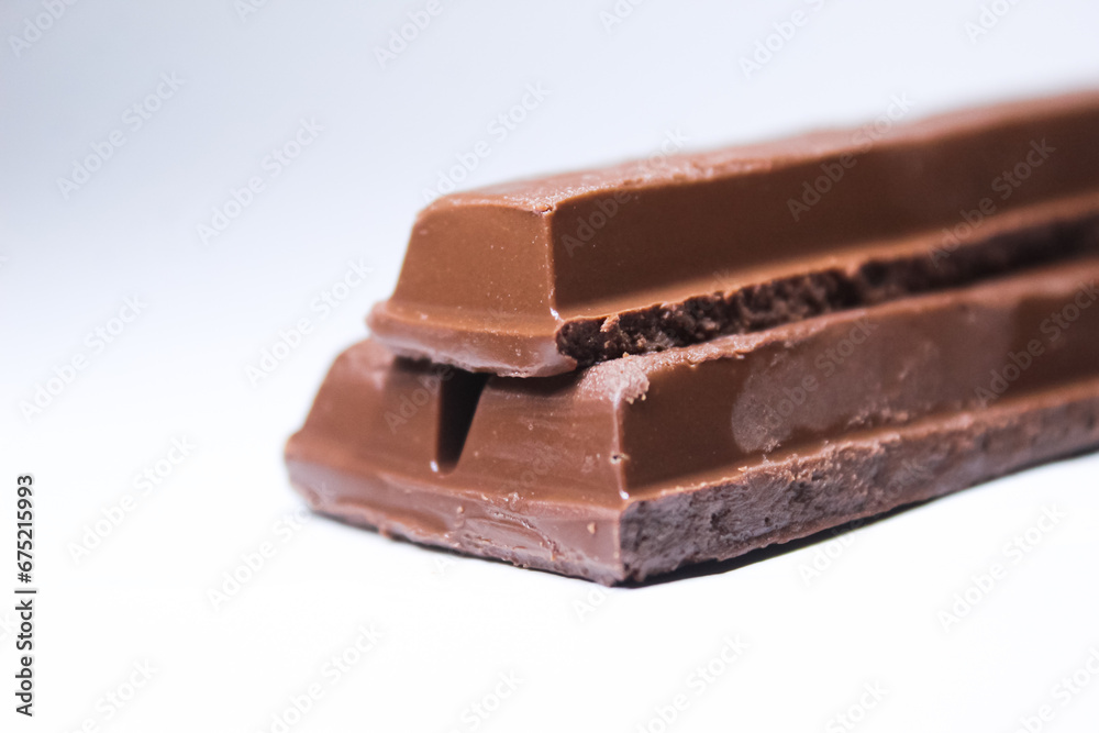 chocolate pieces on white background chocolate pieces on white background