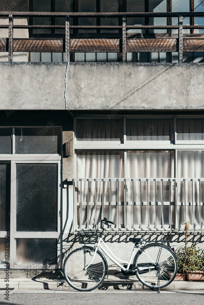 Japanese bicycle on house wall background