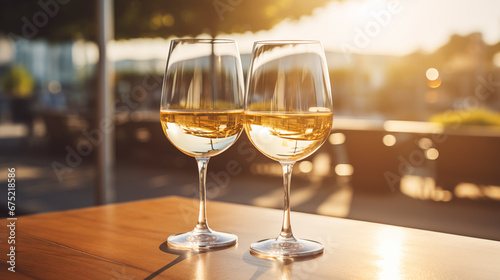 Two glasses of white wine in the sun on a table in a restaurant. Summer holiday. Celebrate and enjoy moment. Alcoholic drink tasting. Romantic evening aperitif. Wine glass close up. Generated AI