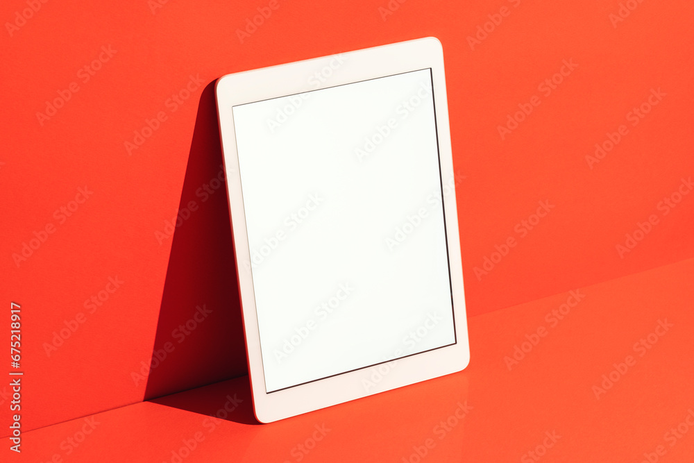 Digital tablet mockup, template on red background Digital tablet mockup, template on red background