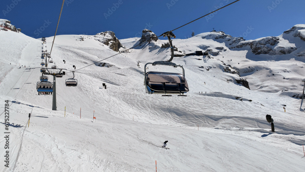 The cableway to mount Titlis over Engelberg on the Swiss alps The cableway to mount Titlis over Engelberg on the Swiss alps