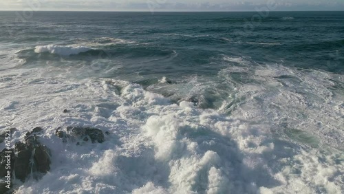 Rough Ocean Waves Rolling In Foamy Surface In Ponteceso, Corme Coruna, Galicia, Spain. Wide Shot photo