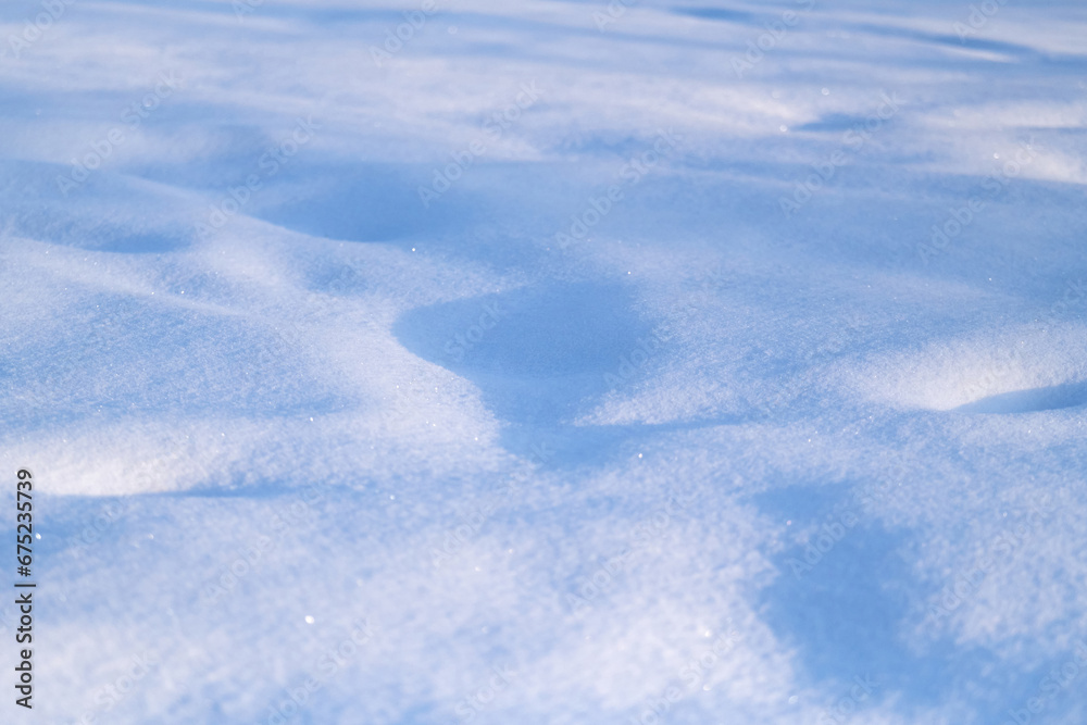 Snow lies on the ground and shines from the sun. Frosty winter day. Cold snowy winter. Snow lies on the ground and shines from the sun. Frosty winter day. Cold snowy winter.