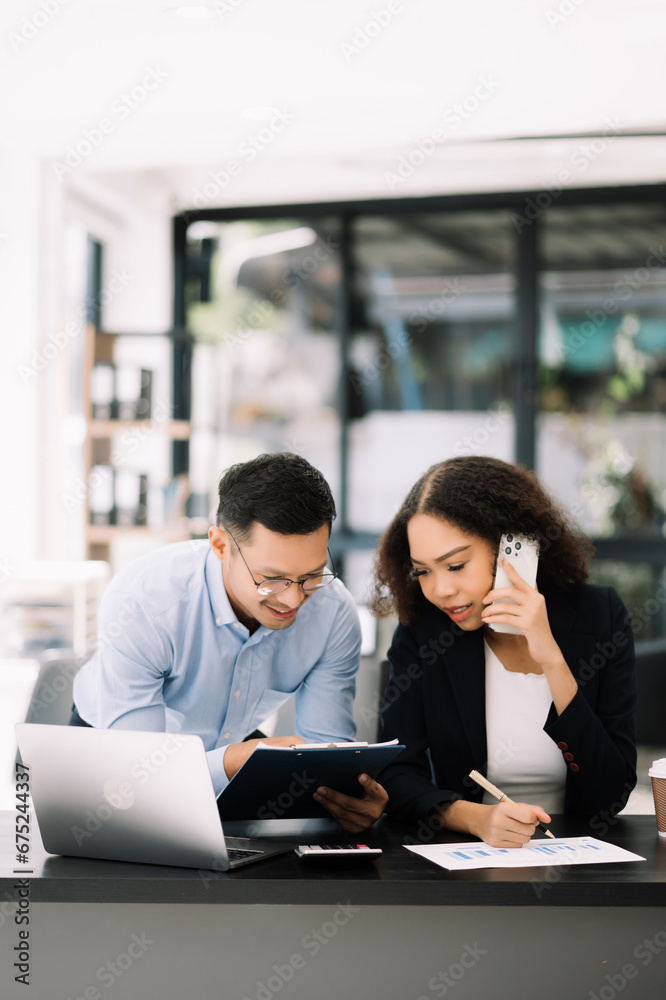 Business leading team meeting and using tablet and laptop with financial in office Business leading team meeting and using tablet and laptop with financial in office