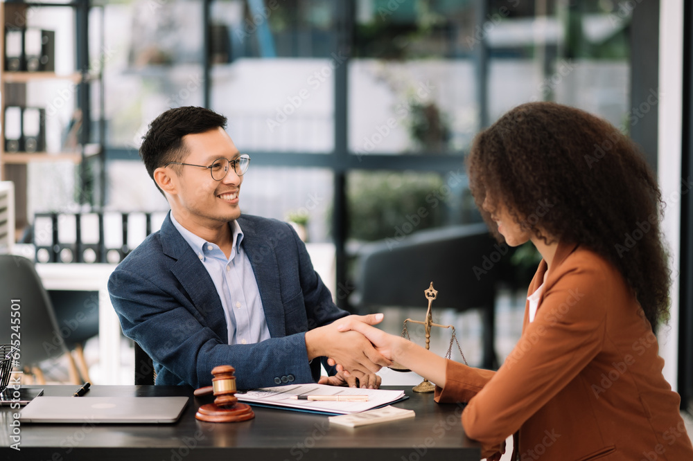 Business team and lawyers discussing contract papers of Claw, advice, legal services. Business team and lawyers discussing contract papers of Claw, advice, legal services.