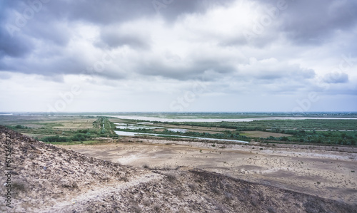 Panoramic view of the Amu Darya River and the fields irrigated by it in the desert of Uzbekistan in Karakalpakstan photo