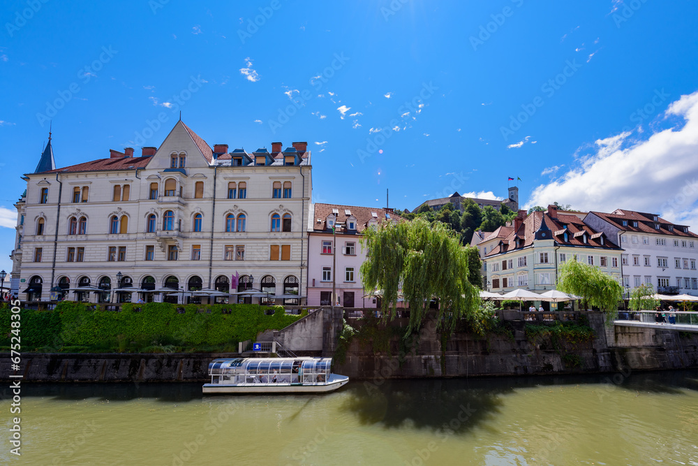 Ljubljana, Slovenia - June 27, 2023: Capital town of Slovenia, Ljubljana with river Ljubljanica in the summer