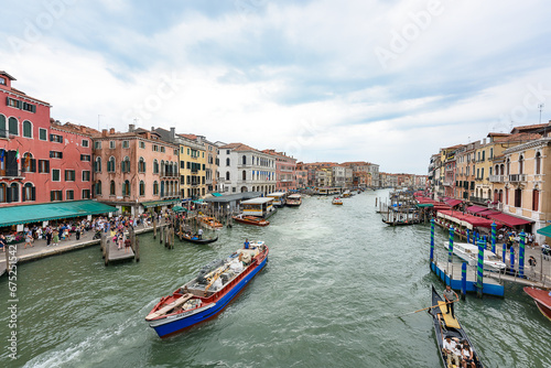 Venice, Italy - June 30, 2023: Venice canal with gondolas, Italy  © nedomacki