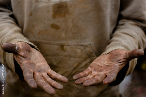 Close up of a man dirty hands
 photo