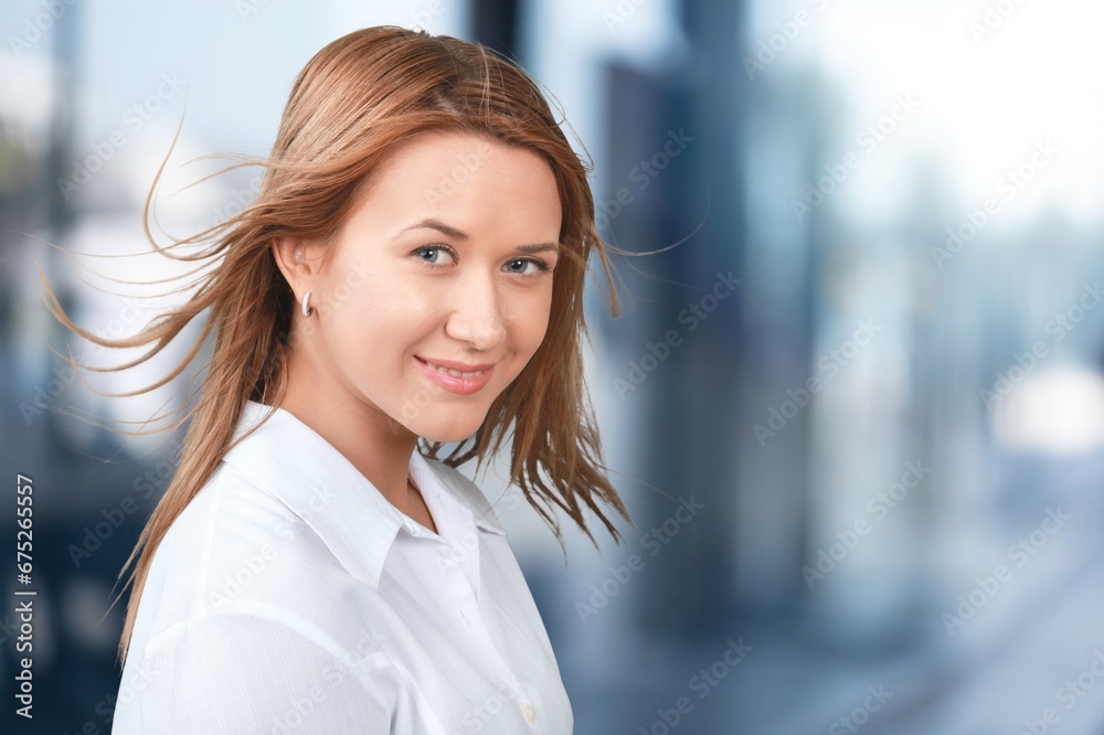 Business woman posing in a modern city Business woman posing in a modern city